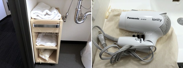 ホテルマンデー豊洲のバスルームのタオルとドライヤー